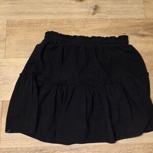 Black Tiered thigh high skirt 
Size: Estimated Large / 10